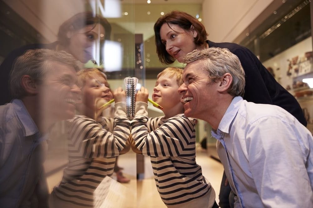 Family looking at a museum display.