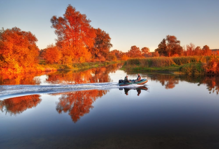 Boat on the lake in autumn.